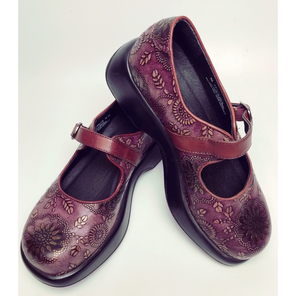 dansko embossed clogs